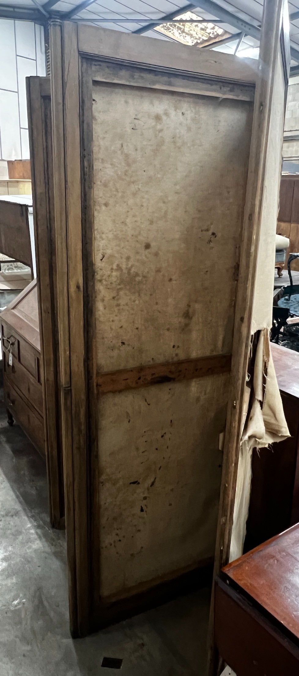 A Victorian pine and beech four fold dressing screen, in need of re-upholstery, each panel width 70cm height 194cm
